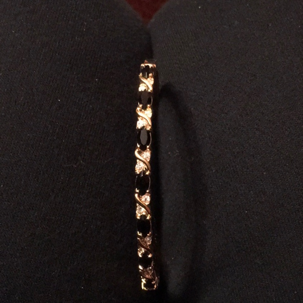 Rhinestones and Black Stones Goldtone Bangle